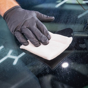 AMMO tough scrub pad for removing embedded dirt from car interiors
