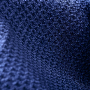 Close-up of waffle weave microfiber glass cleaning towel